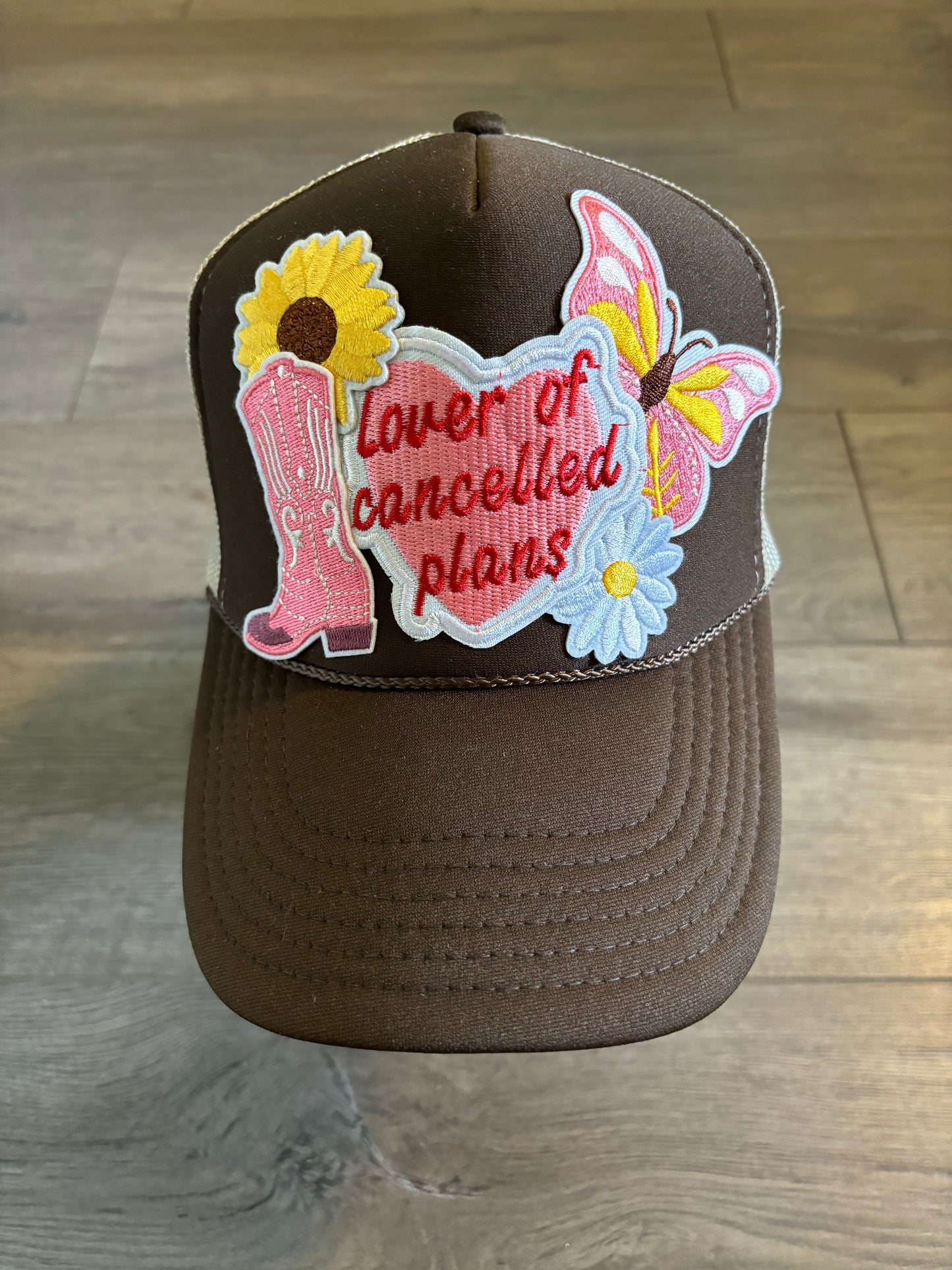 Lover of Cancelled Plans Trucker Hat