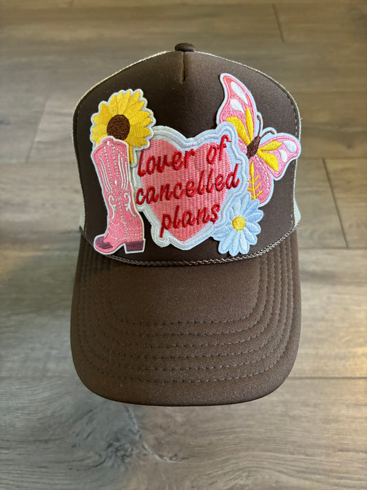 Lover of Cancelled Plans Trucker Hat